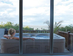 Relax in your hot tub at Azure Seas Holiday Village