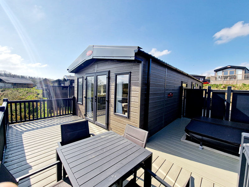Carnaby Chantry Preowned - external with hot tub and decking