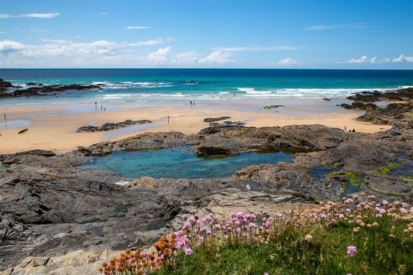 Nearby beach with a rock pool large enough to swim in!