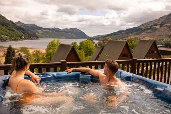 Enjoy relaxing in the hot tub whilst taking in the stunning views - perfect!