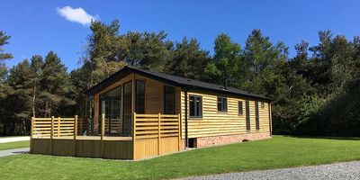 Captain Cook S Haven With Log Cabins Near The Seaside Resort Of Whitby